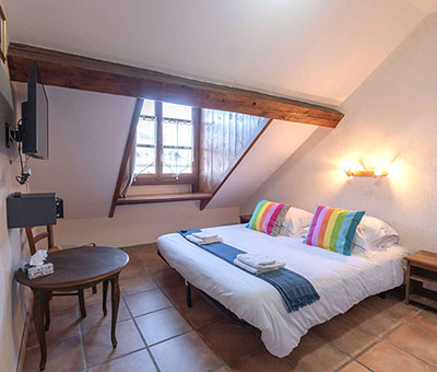 Chambre avec lit double De la chambre double standard à la chambre familiale avec 5 lits